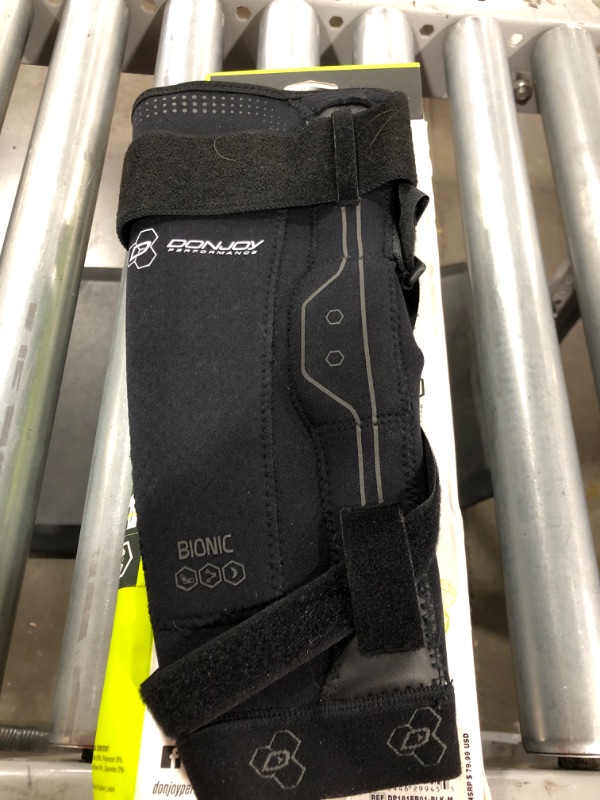 Photo 2 of DonJoy Performance Bionic Elbow Brace II - Medium - Maximum Hinged Support for Elbow Hyperextension, UCL, Tommy John Ligament Injury, Dislocated Elbow for Football, Lacrosse, Rugby, Basketball
