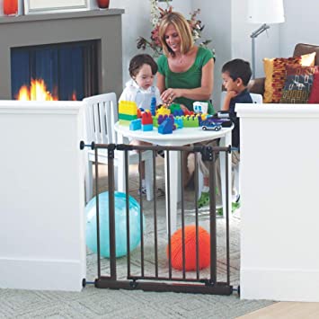 Photo 1 of Toddleroo by North States 38.5" Wide Deluxe Easy Close Baby Gate: Sturdy Safety gate with one Hand Operation. Pressure Mount. Fits Openings 28" - 38.5" Wide (29" Tall, Bronze)
