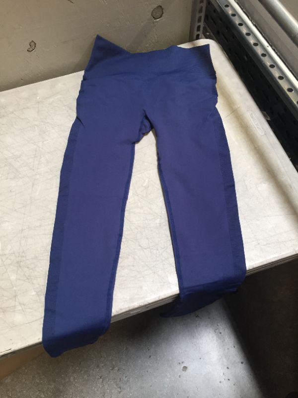 Photo 1 of WOMENS LEGGINGS BLUE
SIZE LARGE (MARKED AS LARGE POSSIBLY MEDIUM)