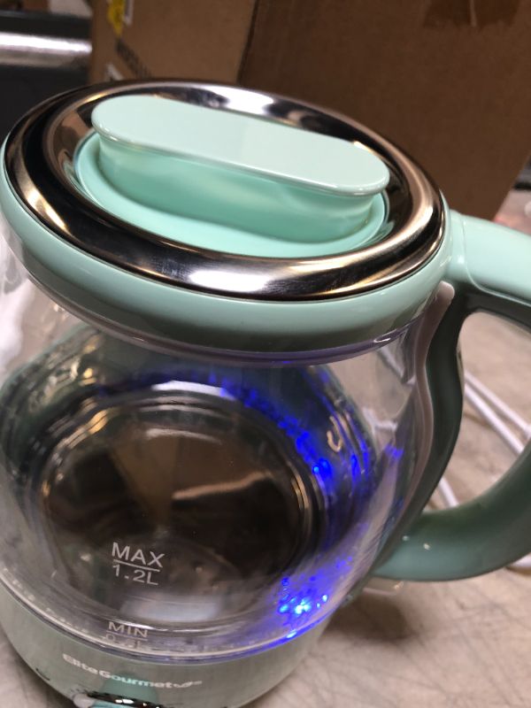 Photo 2 of Elite Gourmet EKT1220M Electric BPA-Free Glass Kettle, Temperature Dial, Keep Warm Function, Cordless 360° Base, Blue LED Interior, Auto Shut-Off Function – Quick Boil, 1.2 Liters, Mint

