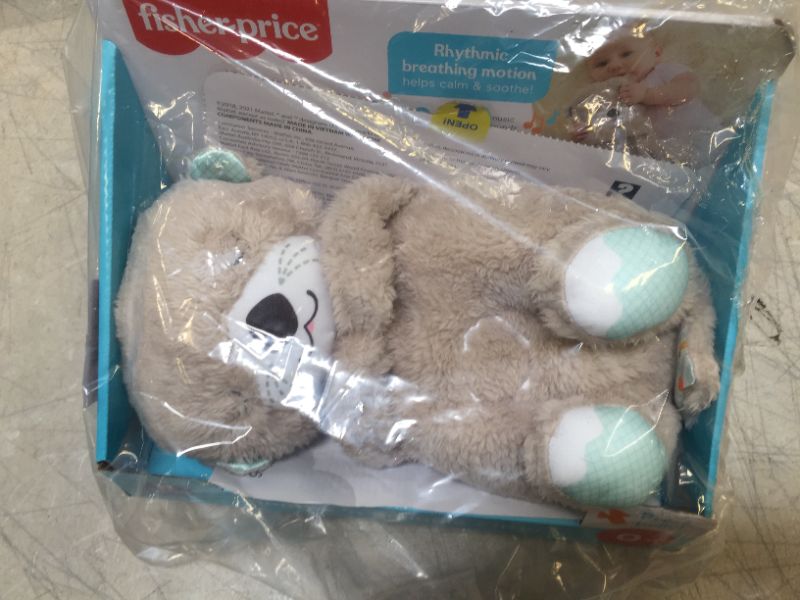 Photo 2 of Fisher-Price Soothe 'n Snuggle Otter, Portable Plush Soother with Music, Sounds, Lights and Breathing Motion, Multi
