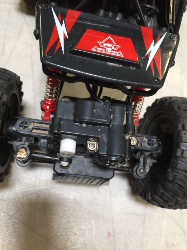 Photo 4 of TEMI RC Cars 1:14 Scale Remote Control Car, 4WD Dual Motors Rock Crawler, Speed 20 Km/h All Terrains Electric Toy Off Road RC Monster Truck with Two Rechargeable Batteries for Boys Kids and Adults---ITEM IS DIRTY---
