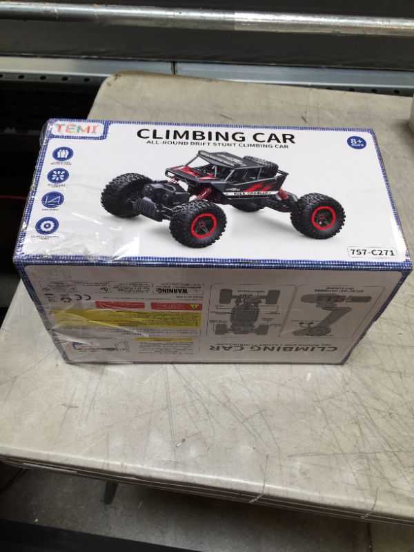 Photo 5 of TEMI RC Cars 1:14 Scale Remote Control Car, 4WD Dual Motors Rock Crawler, Speed 20 Km/h All Terrains Electric Toy Off Road RC Monster Truck with Two Rechargeable Batteries for Boys Kids and Adults---ITEM IS DIRTY---
