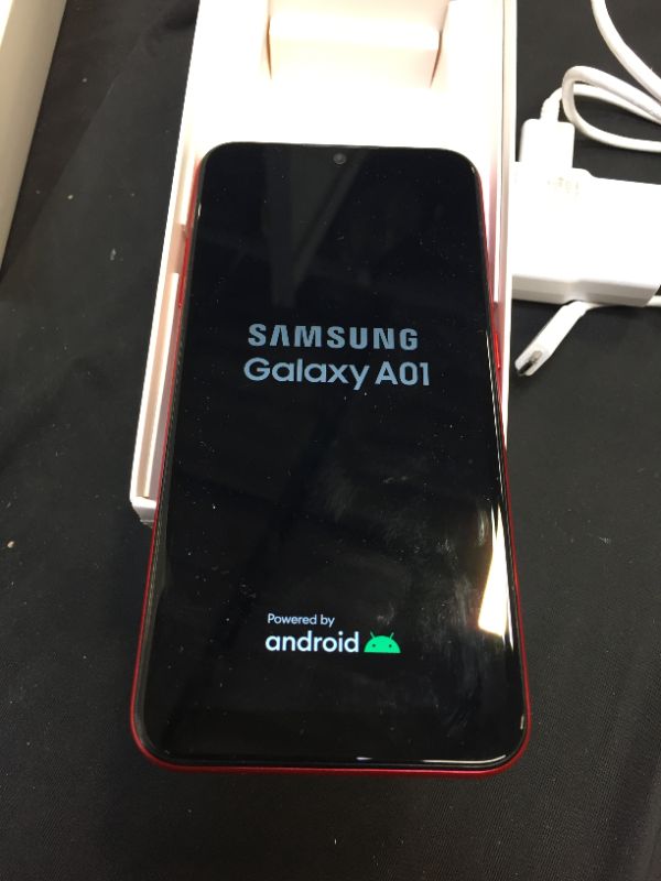 Photo 1 of Samsung galaxy a01 ( 64GB , red ) bundle SD card 