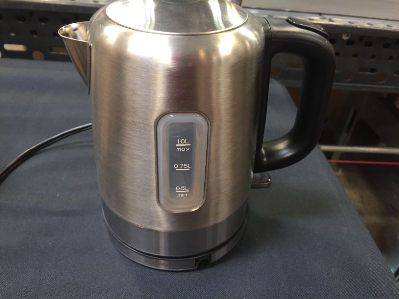 Photo 2 of Amazon Basics Stainless Steel Fast, Portable Electric Hot Water Kettle for Tea and Coffee, 1.7-Liter, Silver
