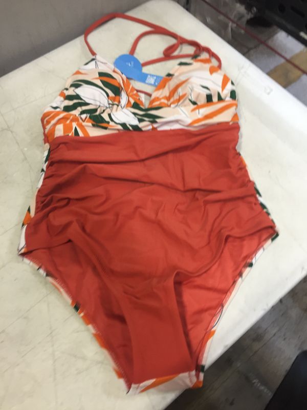 Photo 2 of cupshe brand one piece orange and floral swimsuit --size S - M