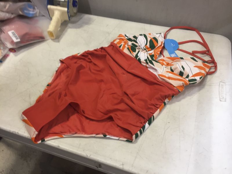 Photo 1 of cupshe brand one piece orange and floral swimsuit --size S - M