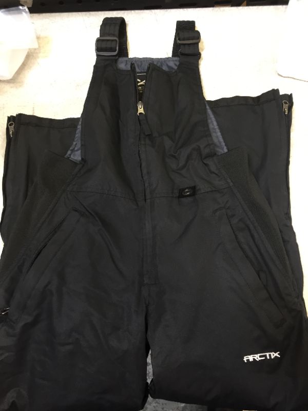 Photo 2 of Arctix womens Essential Insulated Bib Overalls size extra small color black 
