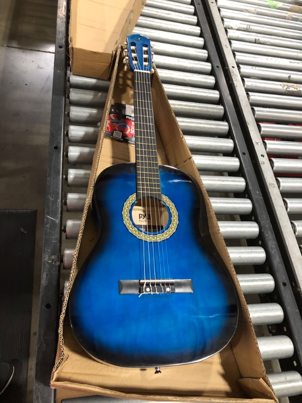 Photo 2 of Beginner 36” Classical Acoustic Guitar - 3/4 Junior Size 6 String Linden Wood Guitar w/ Gig Bag, Tuner, Nylon Strings, Picks, Strap, For Beginners, Adults - Pyle PGACLS82BLU (Blue Burst) Blue Fade
