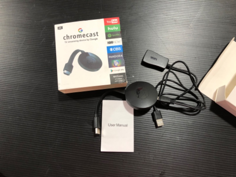 Photo 2 of Google Chromecast - Streaming Device with HDMI Cable - Stream Shows, Music, Photos, and Sports from Your Phone to Your TV
