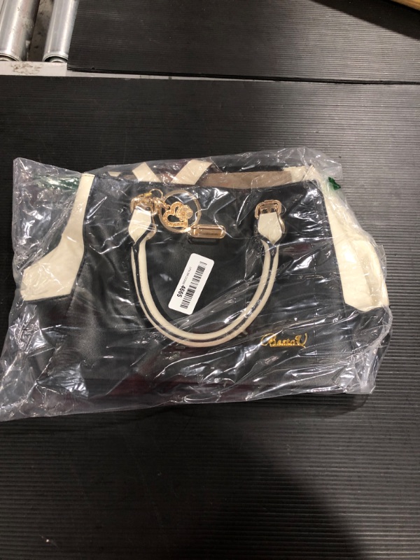 Photo 1 of Black and white purse 