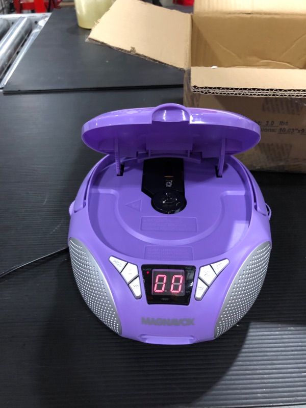 Photo 2 of Magnavox MD6924-PL Portable Top Loading CD Boombox with AM/FM Stereo Radio in Purple 