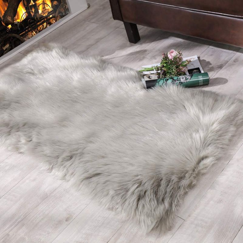 Photo 1 of Carvapet Shaggy Soft Faux Sheepskin Fur Area Rugs Floor Mat Luxury Beside Carpet for Bedroom Living Room 2ft x 4ft, Grey

