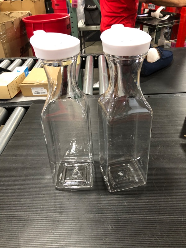 Photo 1 of 2 of the clear plastic round bottle