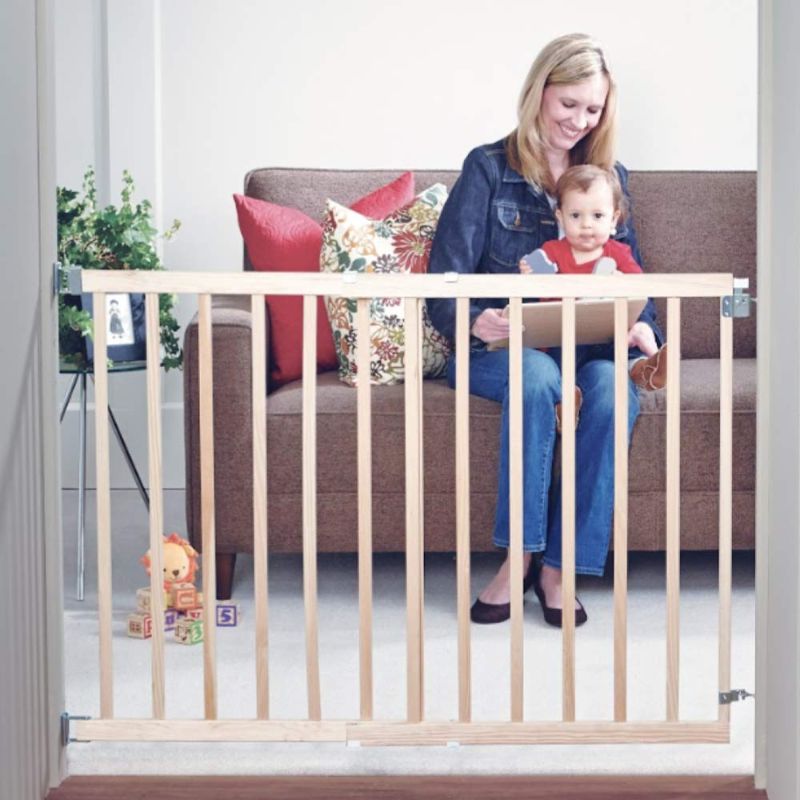 Photo 1 of Toddleroo by North States 42" Wide Stairway Swing Baby Gate Made in USA: for stairways. Swing Control Hinge & one Hand Operation. Hardware Mount. Fits 28"- 42" Wide (30" Tall, Sustainable Hardwood)