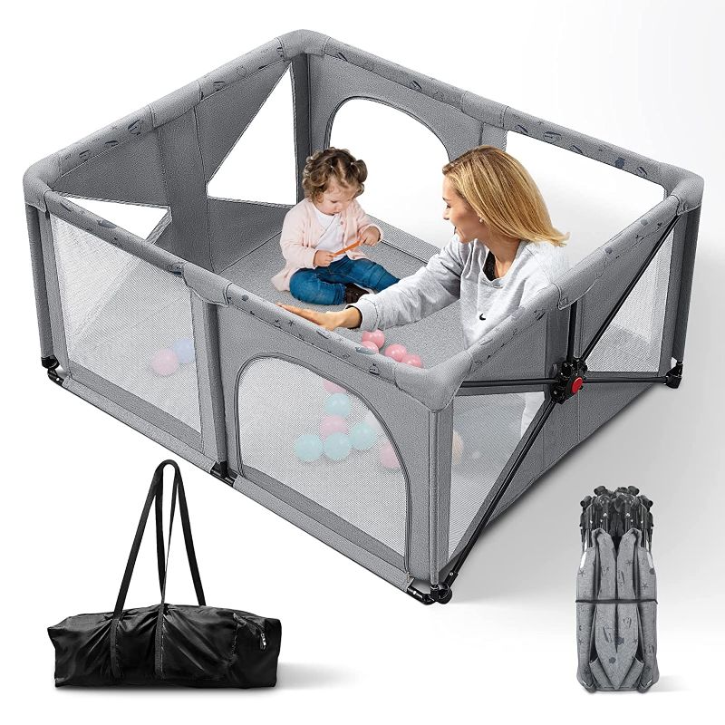 Photo 1 of Foldable Baby Playpen, Portable Play Yard with Carry Bag, Lightweight Play Pen for Babies and Toddlers Indoor and Outdoor Use, Easy to Assemble or Disassemble, Compact Size 59x47x28 Inches, Dark Gray With Matt