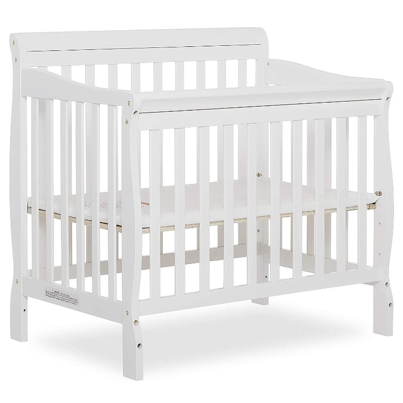 Photo 1 of Dream On Me Aden 4-in-1 Convertible Mini Crib in White, Greenguard Gold Certified