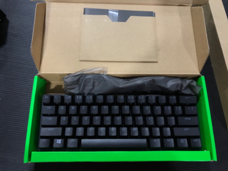 Photo 2 of Razer Huntsman Mini 60% Gaming Keyboard: Fast Keyboard Switches - Clicky Optical Switches - Chroma RGB Lighting - PBT Keycaps - Onboard Memory - Classic Black
