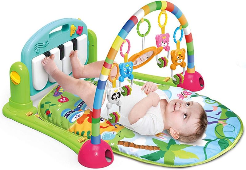 Photo 1 of WYSWYG Baby Gym Jungle Musical Play Mats for Floor, Kick and Play Piano Gym Activity Center with Music, Lights, and Sounds Toys for Infants and Toddlers Aged 0 to 6 to 12 Months (Green)