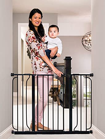 Photo 1 of Regalo Easy Step 49-Inch Extra Wide Baby Gate, Includes 4-Inch and 12-Inch Extension Kit,Pressure Mount Kit and 4 Pack of Wall Mount Kit, Black
