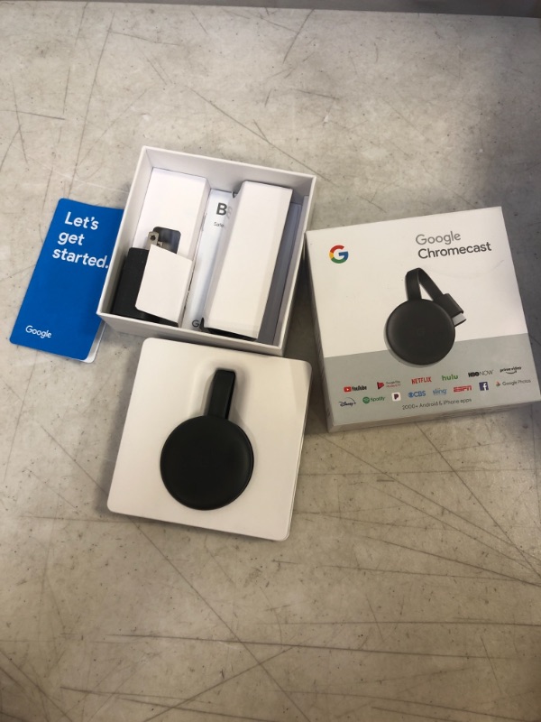 Photo 2 of Google Chromecast - Streaming Device with HDMI Cable - Stream Shows, Music, Photos, and Sports from Your Phone to Your TV
