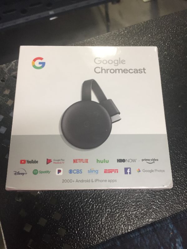 Photo 1 of Google Chromecast - Streaming Device with HDMI Cable - Stream Shows, Music, Photos, and Sports from Your Phone to Your TV
