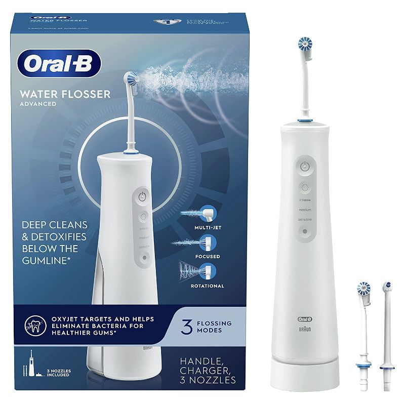 Photo 1 of Oral-B Water Flosser Advanced, Cordless Portable Oral Irrigator Handle with 3 Nozzles -- Used