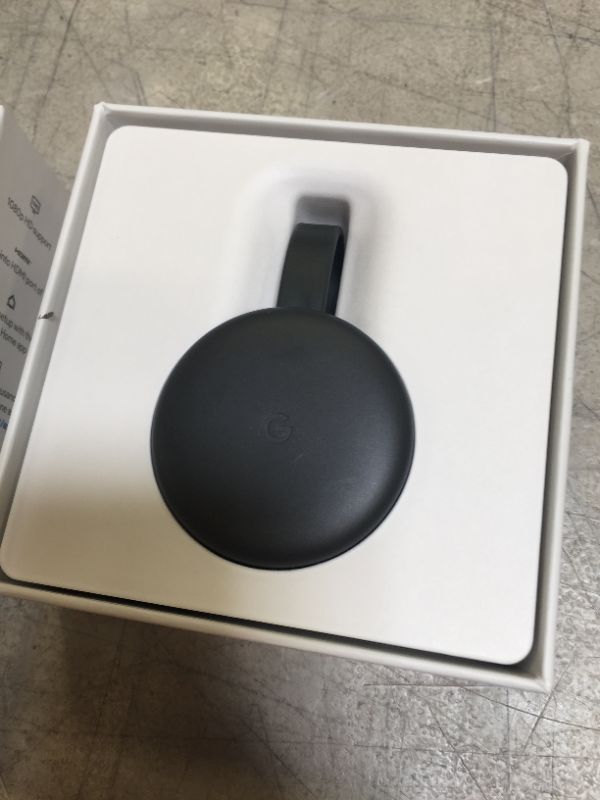 Photo 2 of Google Chromecast - Streaming Device with HDMI Cable - Stream Shows, Music, Photos, and Sports from Your Phone to Your TV
