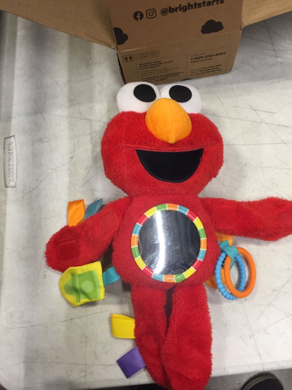 Photo 1 of Bright Starts Sesame Street Elmo Travel Buddy Plush Take-Along Stroller or Carrier Toy, Ages 0-12 Months

