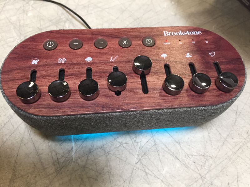 Photo 1 of Brookstone White Noise Sound Machine Mixer | 8 Natural Sounds | 7 Night-Light Colors | Auto-Off Timer | Customizable Sounds for Sleep or Meditation | Wood Finish
