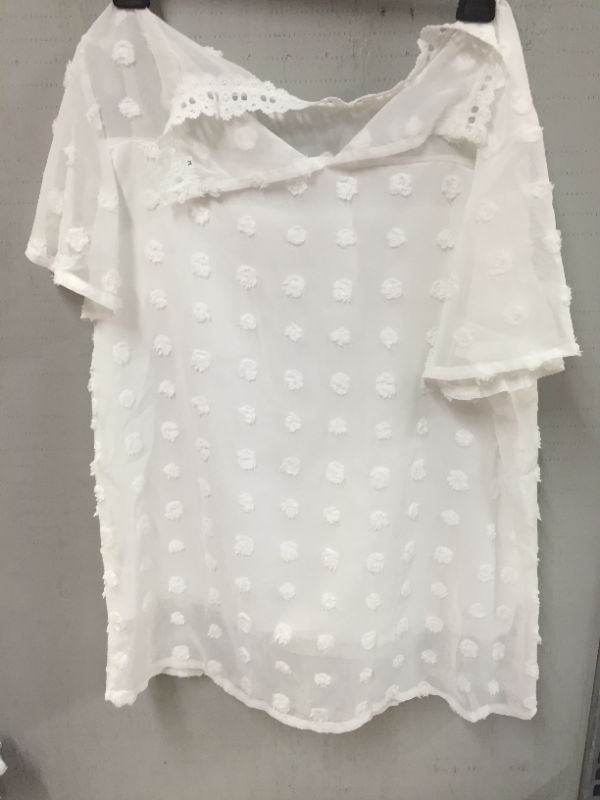 Photo 1 of womens clothing ---color white -- unknown size 