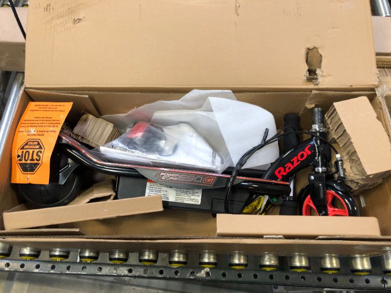 Photo 1 of Razor Power Core E90 Glow Electric Scooter - Hub Motor, LED Light-Up Deck, Up to 10 mph and 60 min Ride Time, for Kids 8+ , Black/Red (Glow)
