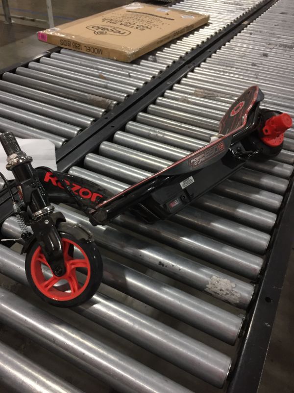 Photo 1 of Razor Power Core E90 Glow Electric Scooter for Kids Ages 8+ - 90w Hub Motor, LED Light-Up Deck, Up to 10 mph and 60 min Ride Time, For Riders up to 120 lbs

