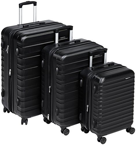 Photo 1 of AmazonBasics Hardside Spinner Suitcase Luggage with Wheels