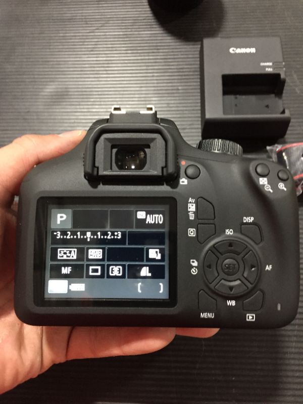 Photo 2 of Canon EOS Rebel T100 DSLR Camera w/EF-S 18-55mm f/3.5-5.6 DC Lens
