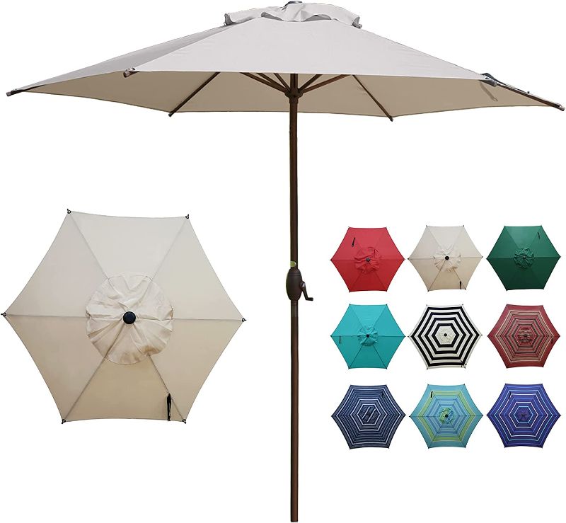 Photo 1 of Abba Patio 9ft Patio Umbrella Outdoor Umbrella Table Market Umbrella with Push Button Tilt and Crank for Garden, Lawn, Deck, Backyard & Pool, Beige

