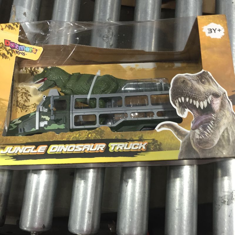 Photo 2 of Dinosaur Toys Die-cast Transporter Jungle Truck and 9 Inch Tall Tyrannosaurs Rex Dinosaur Toy - Growls and Moves as The Dino Truck Rolls, Lights Up - Toy Dinosaur Play Set for Boys and Girls
