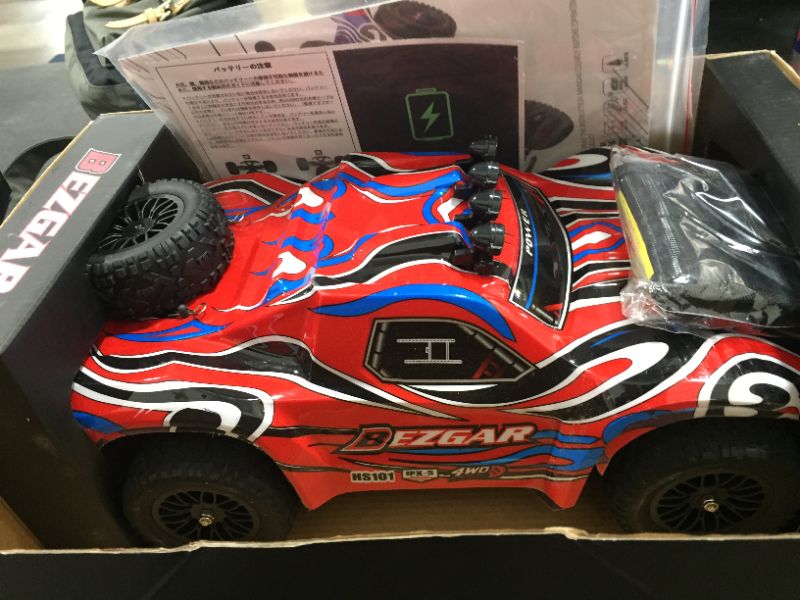 Photo 2 of BEZGAR HS101 Hobby Grade 1:10 Scale Remote Control Truck 4WD Top Speed 40+ Km/h All Terrains Electric Toy Off Road RC Monster Vehicle Car Crawler with 2 Rechargeable Batteries for Boys Kids and Adults
