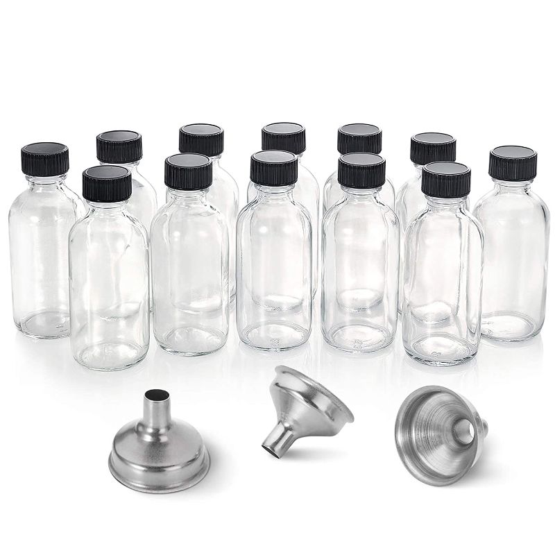 Photo 1 of 12, 2 oz Small Clear Glass Bottles (60ml) with Lids & 3 Stainless Steel Funnels - Boston Round Sample Bottles for Potion, Juice, Ginger Shots, Oils, Whiskey, Liquids - Mini Travel Bottles, NO Leakage
