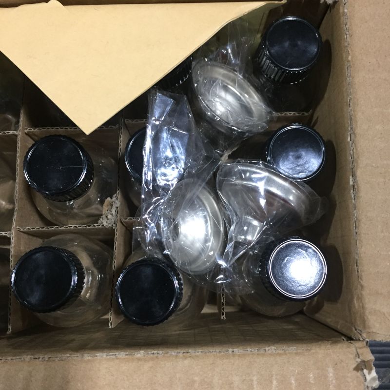 Photo 1 of 12, 2 oz Small Clear Glass Bottles (60ml) with Lids & 3 Stainless Steel Funnels - Boston Round Sample Bottles for Potion, Juice, Ginger Shots, Oils, Whiskey, Liquids - Mini Travel Bottles, NO Leakage
