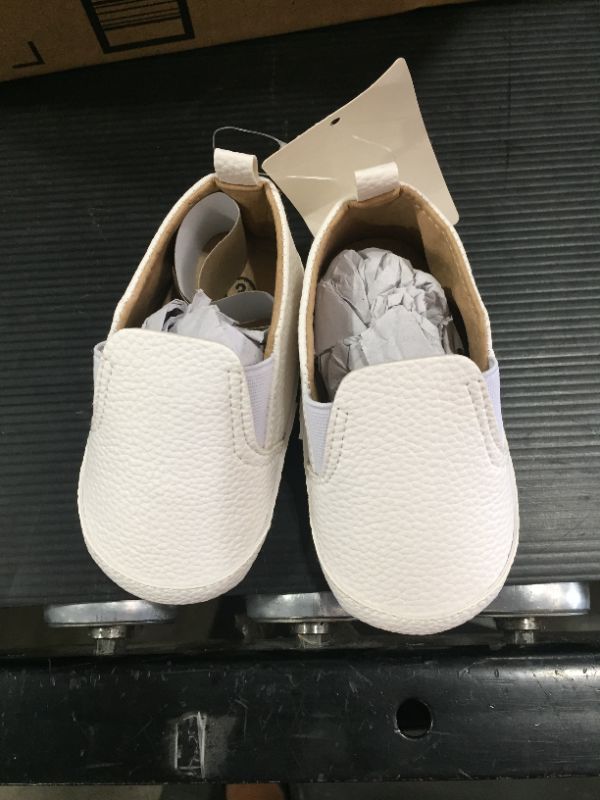 Photo 1 of CRIB SHOES 
WHITE SIZE 12-18 MONS