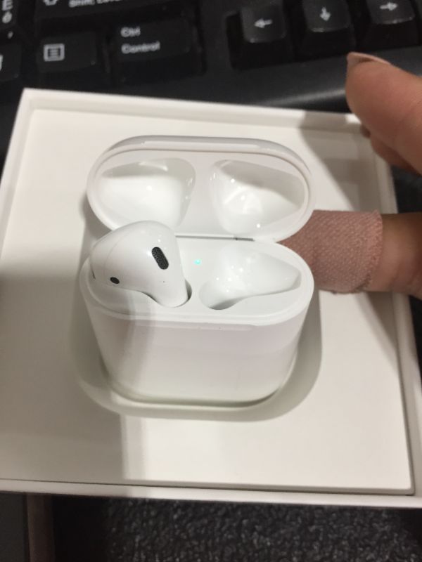 Photo 2 of Apple AirPods with Wireless Charging Case **MISSING RIGHT AIR POD!!!**
