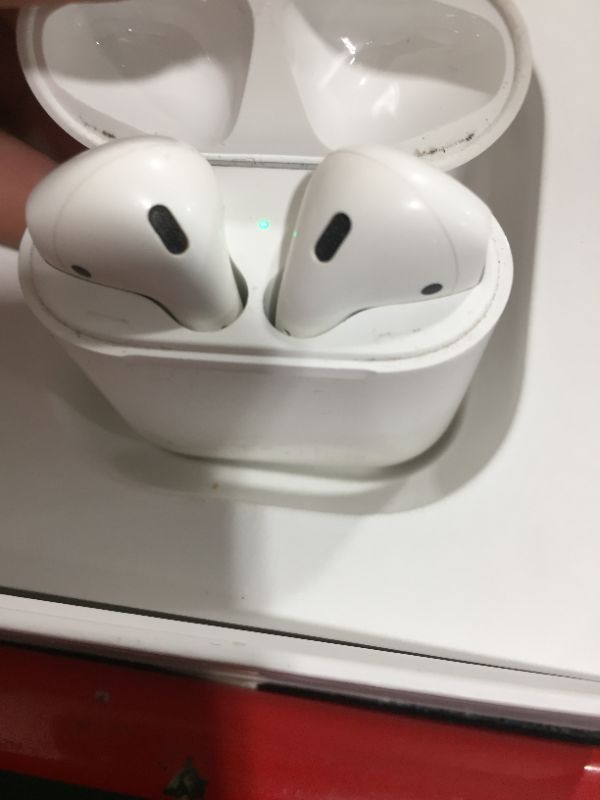 Photo 2 of Apple AirPods (2nd Generation) Wireless Earbuds with Lightning Charging Case Included. Over 24 Hours of Battery Life, Effortless Setup. Bluetooth Headphones for iPhone
