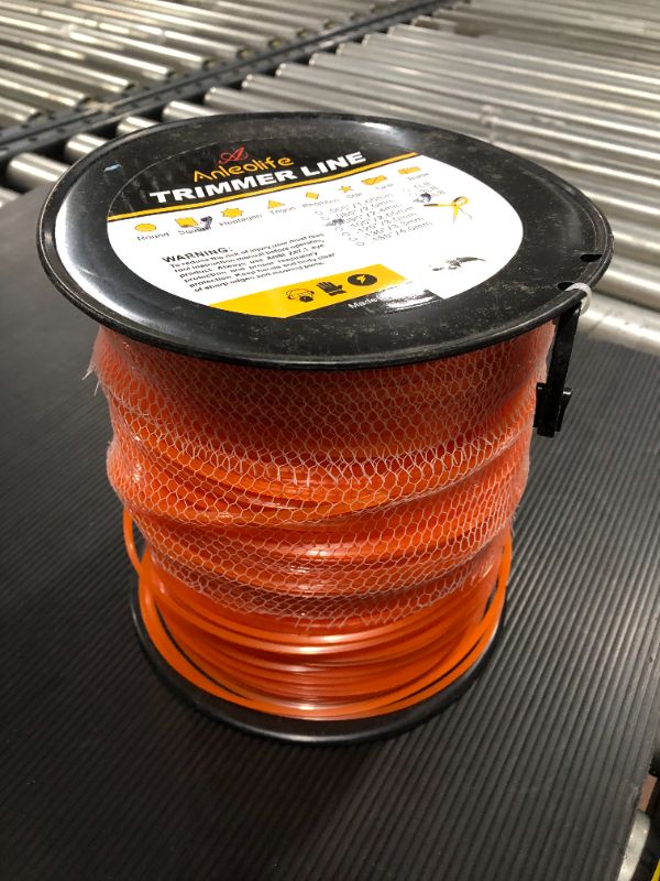 Photo 2 of A ANLEOLIFE 5-Pound Commercial Square .095-Inch-by-1280-ft String Trimmer Line in Spool,with Bonus Line Cutter, Orange
