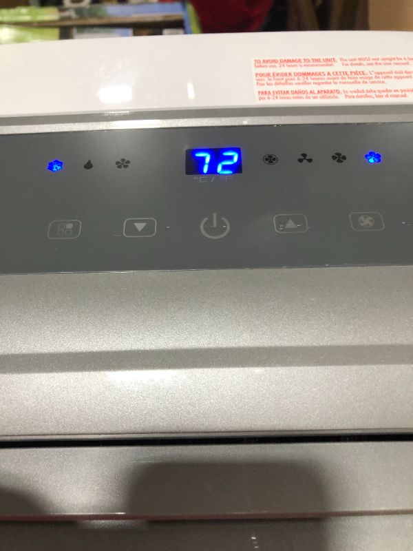 Photo 1 of BLACK+DECKER 14,000 BTU Portable Air Conditioner with Heat and Remote Control, White
