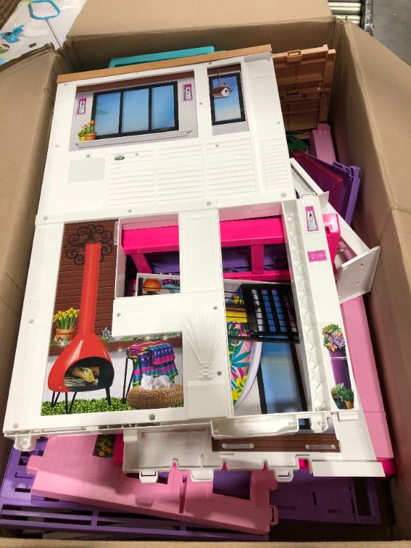Photo 2 of Barbie Dreamhouse (3.75-ft) 3-Story Dollhouse Playset with Pool & Slide, Party Room, Elevator, Puppy Play Area, Customizable Lights & Sounds, 75+ Pieces, Gift for 3 to 7 Year Olds, New for 2021
