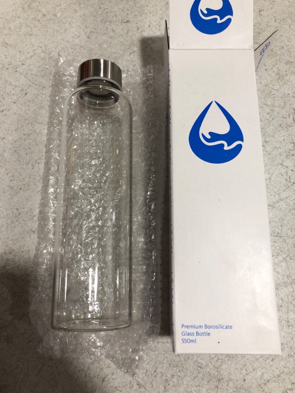 Photo 2 of Aquasana BLUE Premium Borosilicate Glass Bottle with Silicone Sleeve- 550ml - NAVY BLUE
MISSING SLEEVE. BOTTLE ONLY!