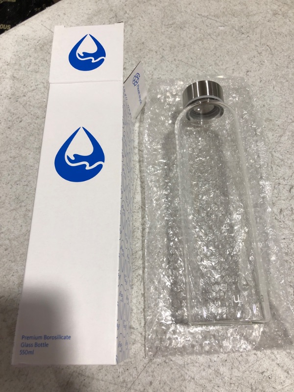 Photo 2 of Aquasana BLUE Premium Borosilicate Glass Bottle with Silicone Sleeve- 550ml - NAVY BLUE
MISSING SLEEVE. BOTTLE ONLY!