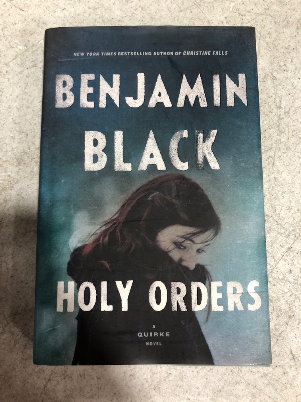 Photo 2 of Holy Orders: A Quirke Novel Hardcover – August 20, 2013
