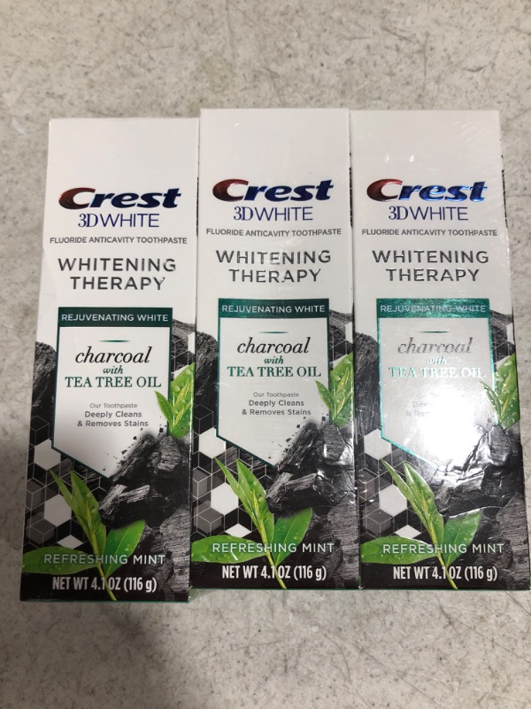 Photo 1 of Crest Charcoal 3D White Toothpaste, Whitening Therapy, with Tea Tree Oil, Refreshing Mint Flavor, 4.1 oz, Pack of 3
